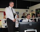 PO Tony Cocker showing Capt Ade Orchard OBE the FDO Simulator 
