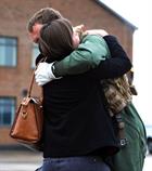 219 Flight Pilot, Lt Lee Holborn greets his girlfriend Alice Nolan after returning to RNAS Yeovilton