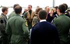 219 Flight Pilot, Lt Lee Holborn is welcomed back by his friends and colleagues after being deployed