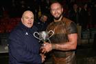 •	Navy Rugby Cup – LAET John Lamsin receives the Navy Cup from Colonel Ewan Murchison