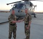 Commander Jon Holroyd (left) being handed control of 820 Naval Air Squadron by the outgoing CO, Comm