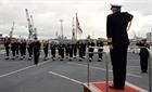 Vice Admiral Sir Philip Jones KCB saluting HMS Dauntless' Ceremonial Guard.