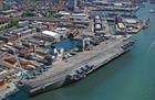 An artist's impression of HMS Queen Elizabeth docked in Portsmouth
