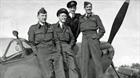 Brown, second right, with colleagues on a Spitfire in 1944
