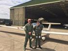 Senior Pilot CPO (SCC) Carl Mason with with Able Cadet Gus from T.S. Skirmisher, Fishguard after ano