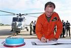 Rob Dowdell signs over the final Wildcat HMA to 825 NAS