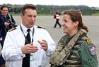Commanding Officer of 815 NAS, Commander Phil Richardson speaks with Lt Laura Cambrook after her ret