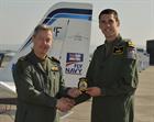 Lieutenant Commander Glenn Allison welcoming Lt Daley Simpson as a staff pilot at 727 NAS