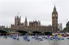 The Sea Cadet flotilla passes the Houses of Parliament