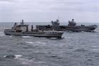 HMS Queen Elizabeth and new supply ship RFA Tidespring meet up at sea for the first time