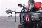 847 NAS Wildcat helicopter carries out vertical replenishment on board FS Dixmude