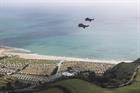 Sea Kings from 849 NAS flying over a campsite in Cornwall.