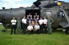 845 Personnel with the ‘Goodwood Girls’ and Sea King helicopter
