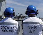207 Sqn and HMS Prince of Wales senior air engineers observe the F-35 on deck