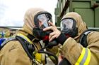 Checking that breathing apparatus is air tight before entering the fire