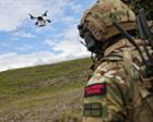 A drone delivers medical supplies to Royal Marines on exercise in the field