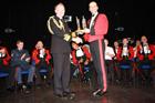 BCSGT Tom Crane receives Bambara Trophy from 2SL Vice Admiral Charles Montgomery CBE ADC