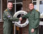 Cdr Deavin hands over command of MUAS & FW Force to Cdr Fellows (right)
