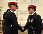 Brig M Ellis OBE RM congratulates Capt Chris Eden RM