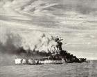 Admiral Graf Spee in flames having suffered a hit to her funnel