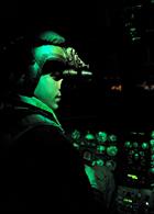 771 NAS pilot at controls of SAR Sea King at night
