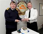 1SL Admiral Mark Stanhope and WO1 Gary Flynn with Cake baked by the engineer colleagues