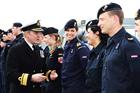Rear Admiral Hockley chats with Dutch and German members of the NATO minehunting force 