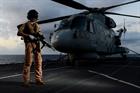 Royal marine of MST and Merlin helicopter