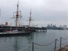 Ark Royal passes HMS Warrior as she leaves the naval base for the final time.