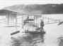 Adams on his modified Curtiss Biplane
