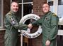 Cdr Deavin hands over command of MUAS & FW Force to Cdr Fellows (right)